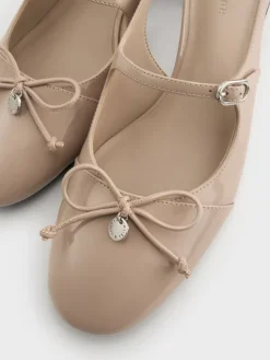 Patent Bow Slingback Pumps