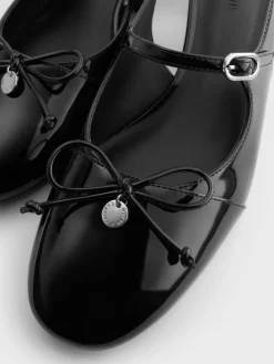 Patent Bow Slingback Pumps