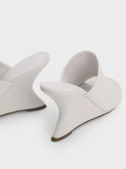Sculptural-Heel Wedges