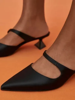 Vada Asymmetric Sculptural Heel Pumps