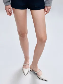 Vada Asymmetric Sculptural Heel Pumps