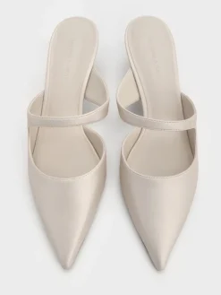 Vada Asymmetric Sculptural Heel Pumps
