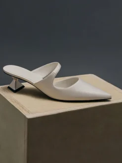 Vada Asymmetric Sculptural Heel Pumps