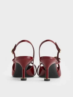 Wynn Patent Asymmetric-Strap Slingback Pumps