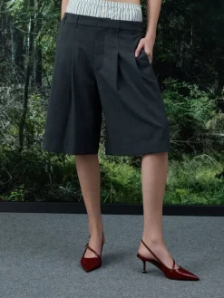 Wynn Patent Asymmetric-Strap Slingback Pumps